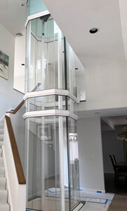 Vuelift Residential Glass Elevator spanning 2 flights of stairs