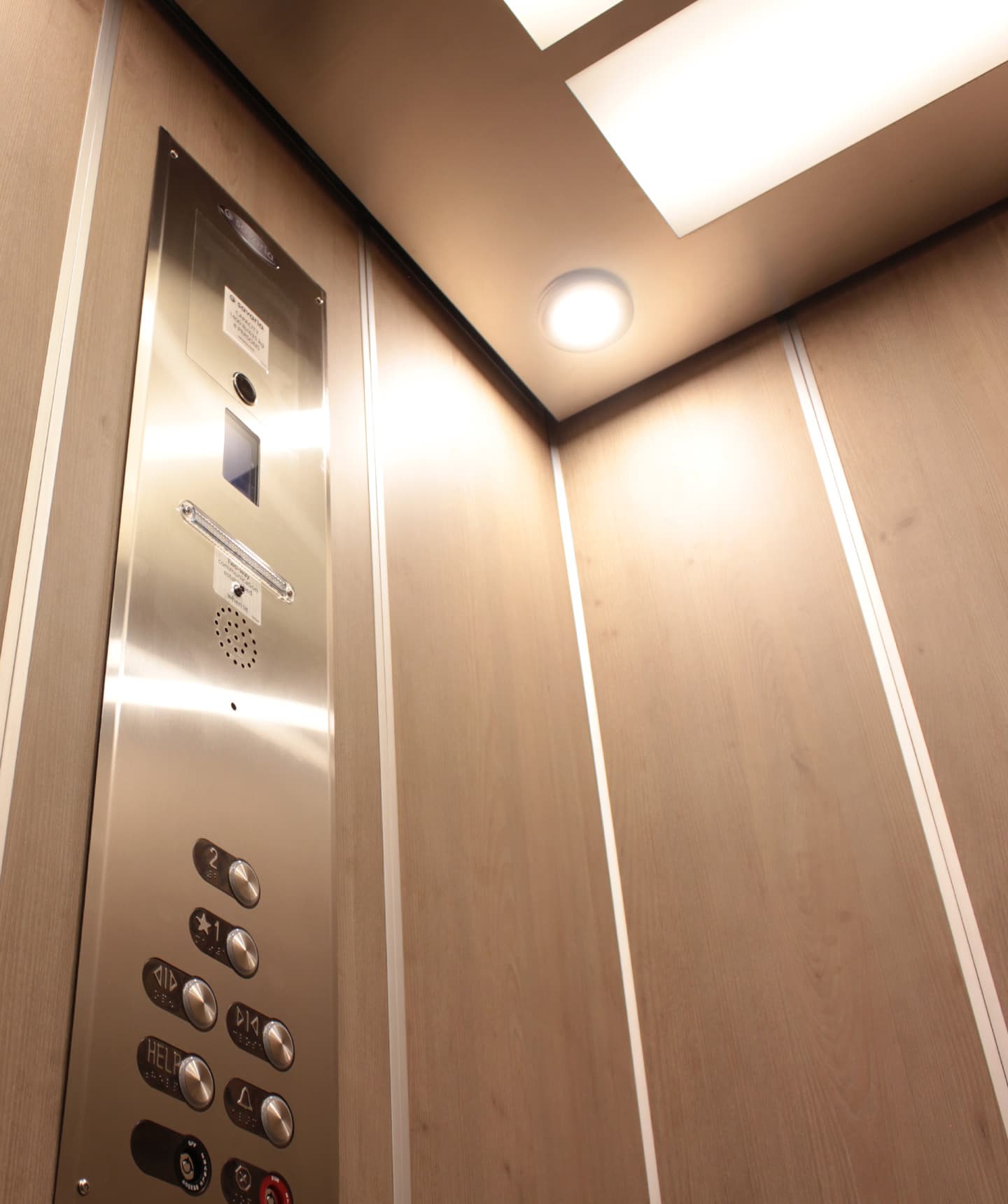 Bright interior of Orion commercial elevator