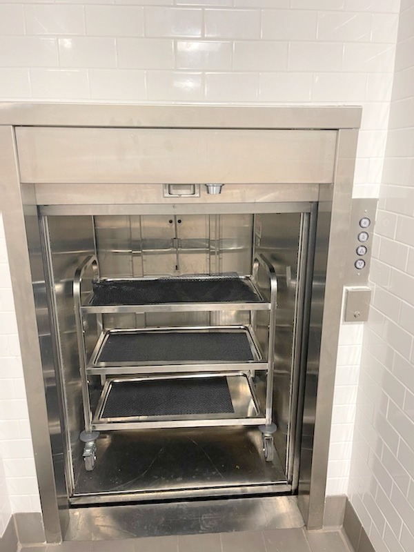 Residential Dumbwaiter with shelves to make moving materials easy