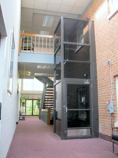 Wheelchair lift that spans two stories